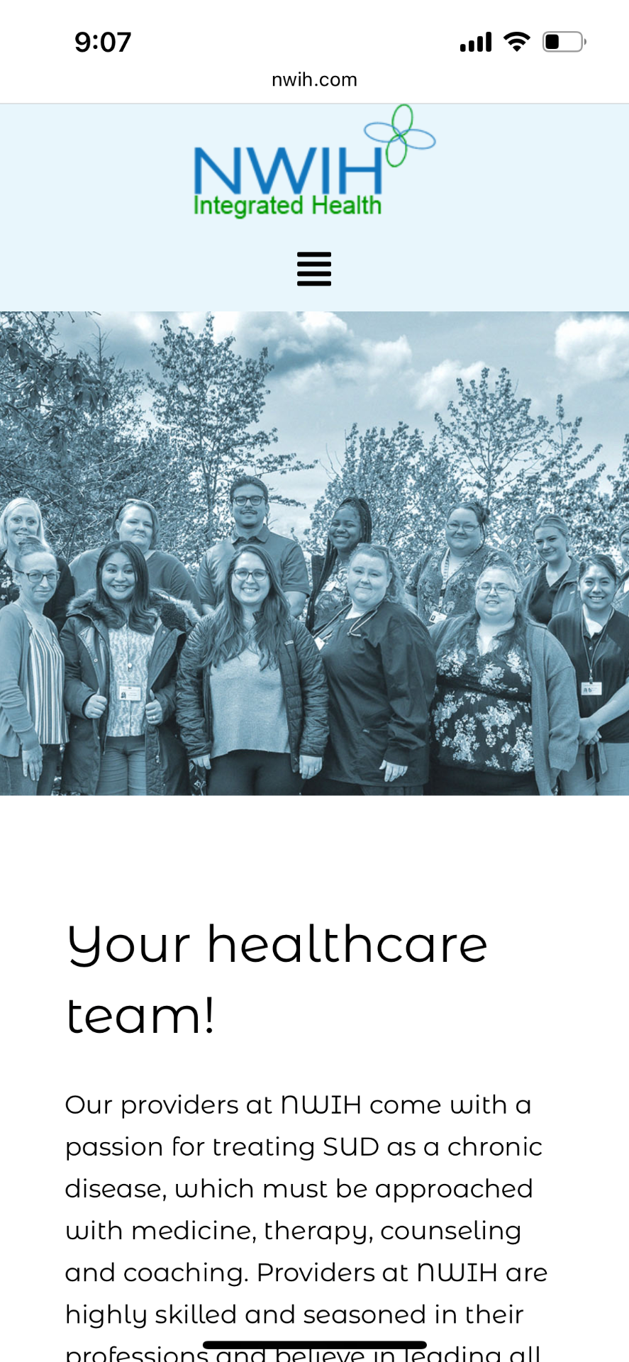 Old NWIH providers page — group photo banner.