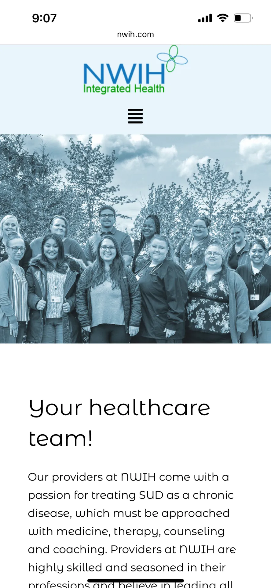 Old NWIH providers page — group photo banner.